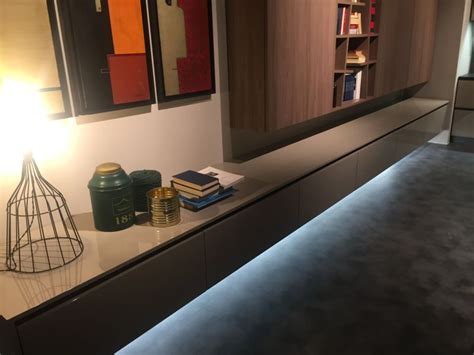 This floor lamp comes with a curved base, making it great for sliding under furniture. 4 in1 LED Smart Strip Light with Wireless Connectivity - Mansaa