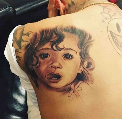 Chris Brown Back Tattoo Meanings And Pictures Of Breezys Back Tattoos