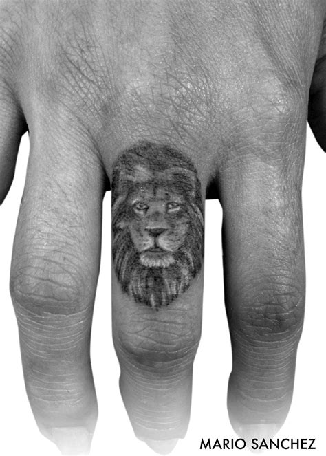 Miniature Lion Tattoo On Finger Lion Tattoo Lion Tattoo On Finger