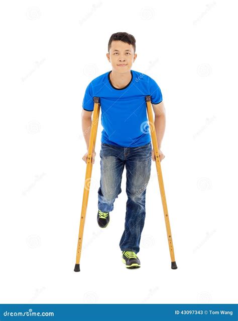 Smiling Young Asian Man On Crutches Stock Image Image Of Orthopaedic