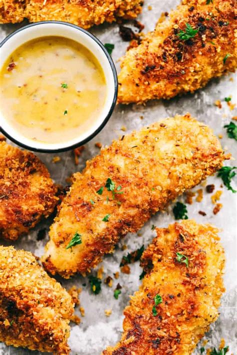 Chicken tenders with garlic butter is one of the best chicken tender recipes. Delicious chicken tenders breaded in a garlic parmesan ...