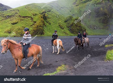 Iceland June 19 2015 Skogafoss Waterfall With Horses And Jockeys