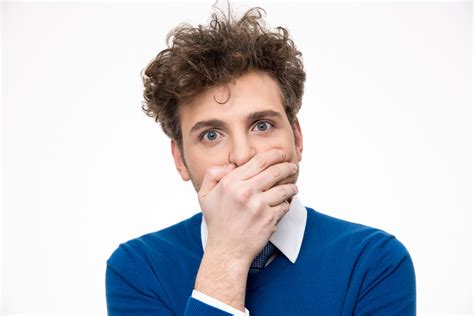 Handsome Man Covering His Mouth Over White Background Royalty Free Stock Image Storyblocks