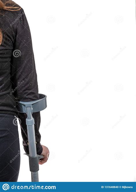 A Young Handicapped Girl Walking With Crutches Stock Photo Image Of