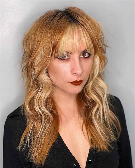 22 Greatest Ways To Pair A Wolf Cut With Bangs
