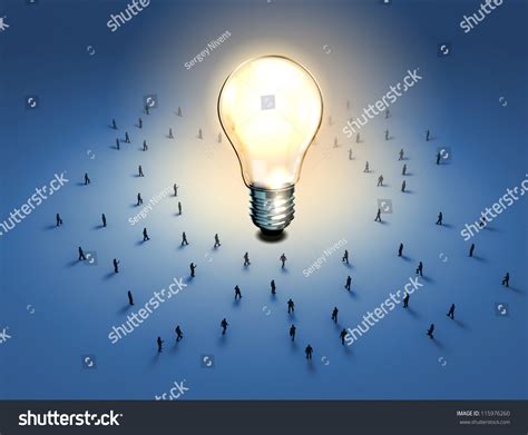 A Group Of Tiny People Walking Towards A Light Bulb Stock