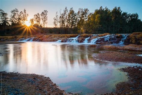 Waterfalls Of A River At Sunset By Stocksy Contributor Acalu Studio