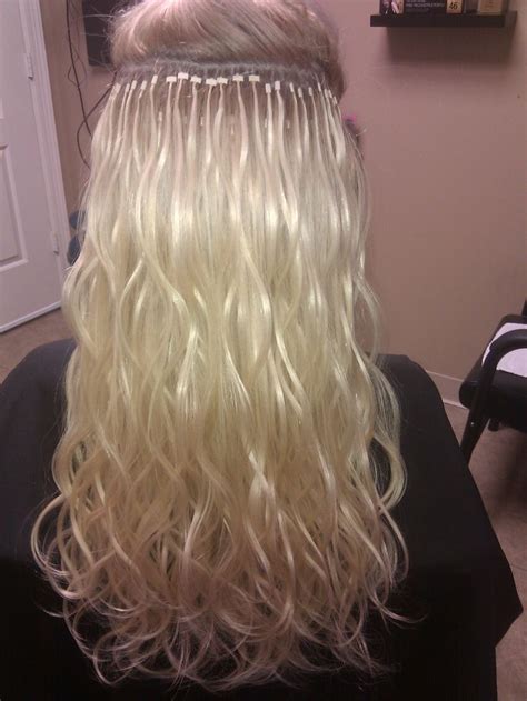 Touch device users, explore by touch or with swipe gestures. Client Pic: Amber After Micro-link hair extensions ...