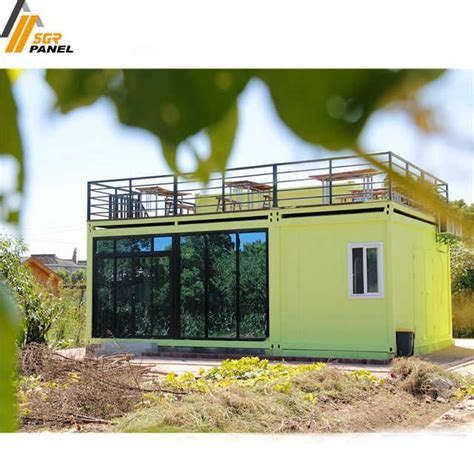 1x40hq can load 2 units.the design of this butterfly container house is two bedrooms, one bathroom, one opening kitchen and one living. Source 2 Bedroom Prefab Container Houses for Sale in ...