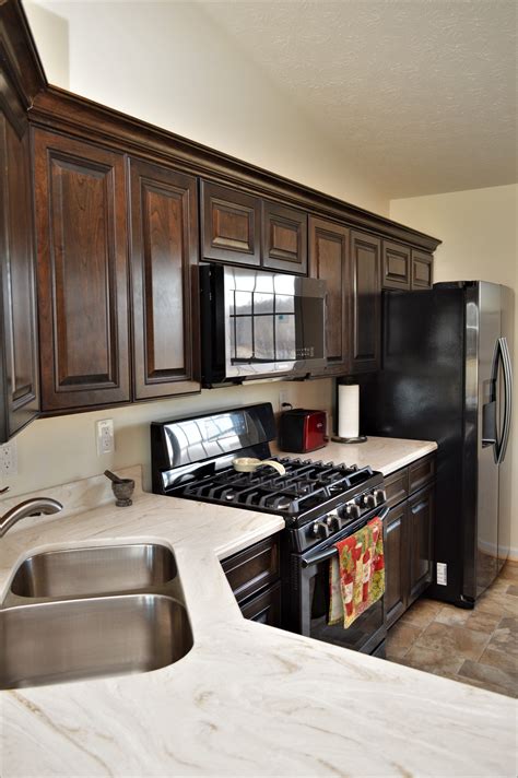 It is actually composed of acrylic and minerals, which are mixed together to form a very hard surface that is nonporous. Dune Prima color | Corian kitchen countertops, Kitchen ...