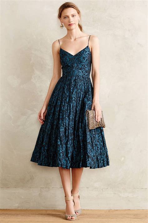 Get glam in a satin maxi dress, the perfect night guest look. Fall Wedding Guest Dresses to Impress - MODwedding