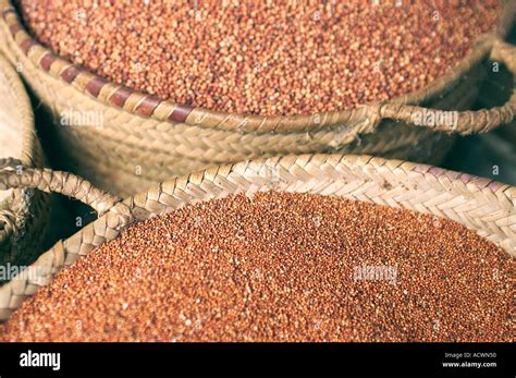 Basket Full Of Millet Grains At A African Market Stock Photo Alamy