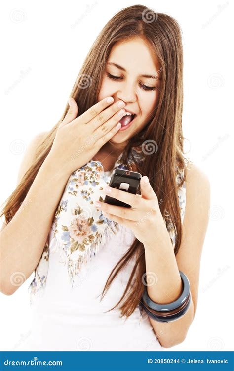 surprised teen girl looking at the mobile phone stock images image 20850244
