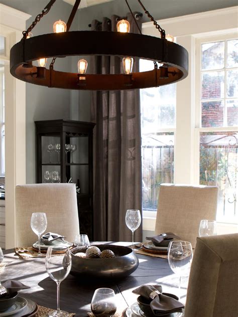 Gray Dining Room With Wheel Shaped Chandelier Hgtv