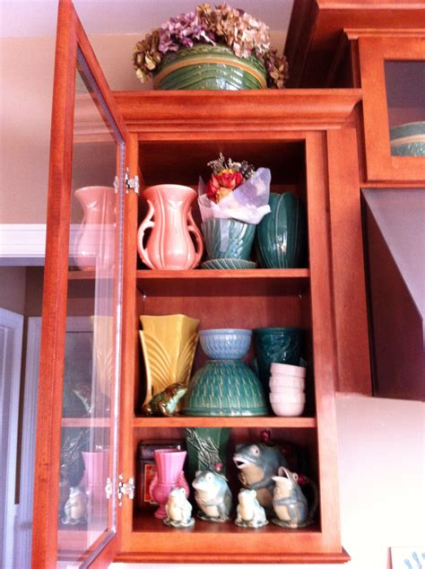 McCoy vases in my kitchen cabinet. | Decor, Home decor, Kitchen cabinets
