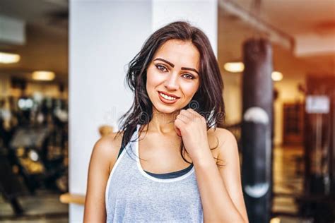 Portrait Of Sporty Pretty Smiling Girl In The Gym Stock Photo Image