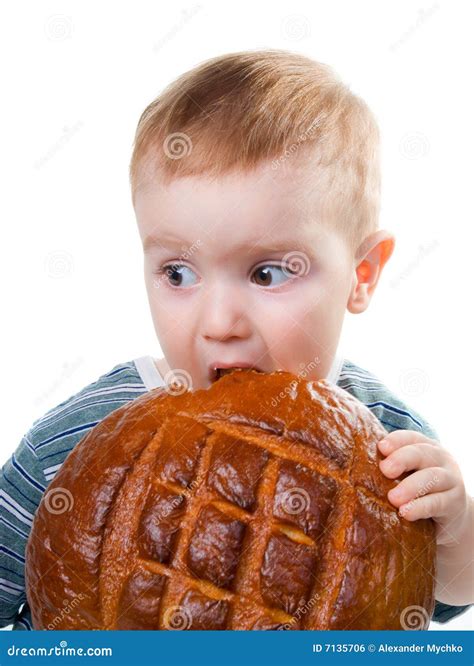 A Little Caucasian Boy Eating A Bread Stock Photo Image Of White