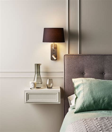 An Adjustable Shaded Wall Light With An Led Adjustable Spot Great For