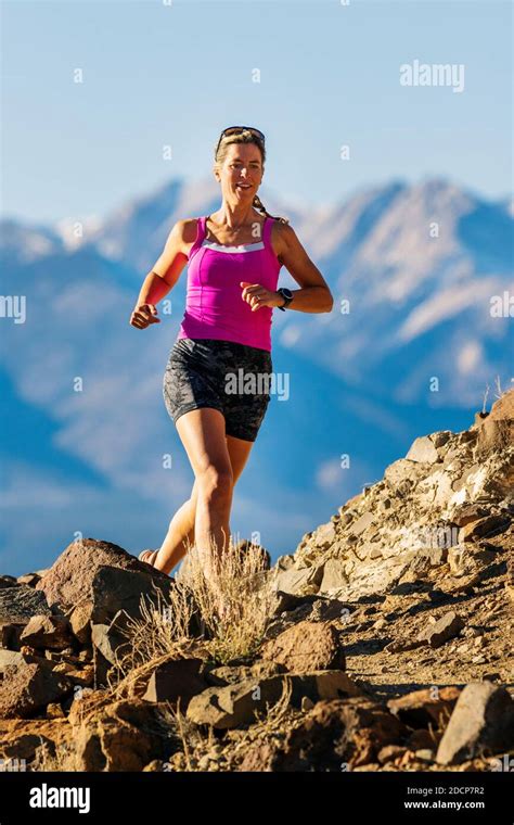 Attractive Fit Woman Running On Mountain Trails Salida Colorado Usa