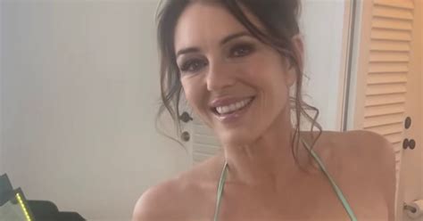 Liz Hurley Wows Fans In Bikini Snaps As She Promotes Latest Film In Run Up To Christmas