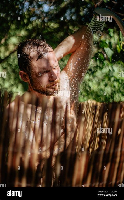 Man Taking Outdoor Shower Hi Res Stock Photography And Images Alamy