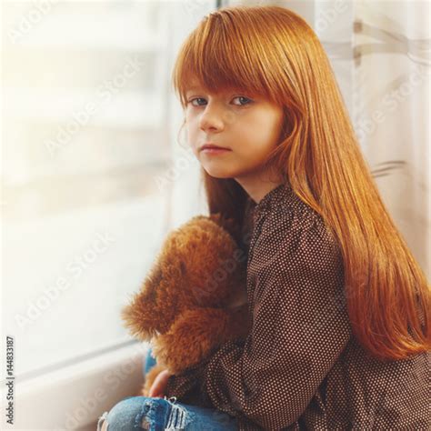 Portrait Of Cute Redhead Girl Stock Photo And Royalty Free Images On