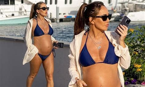 Pregnant Lauryn Goodman Shows Off Her Baby Bump In Dubai Hot