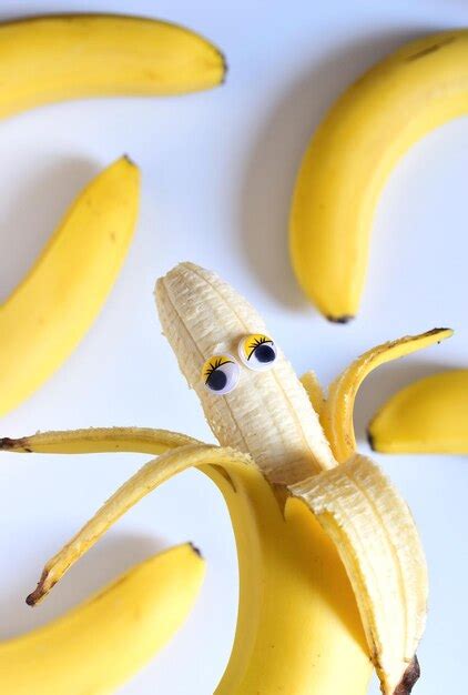 Premium Photo Close Up Of Googly Eyes On Bananas Over Table