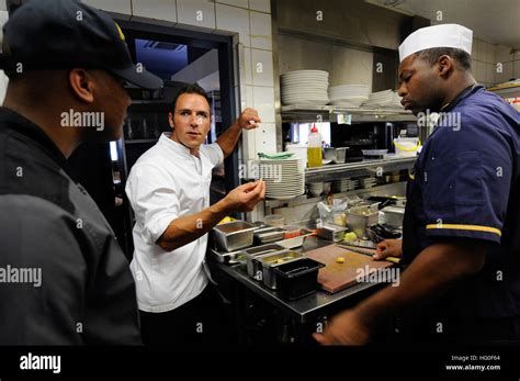 Head Chef Josh Kucharick speaks with visiting Culinary Specialists