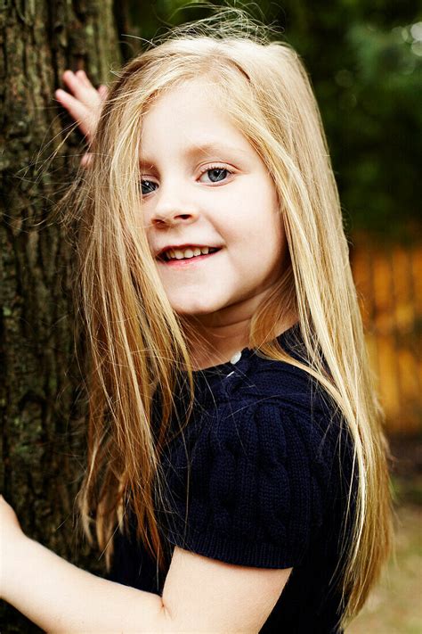 Smiling Girl With Long Blond Hair License Image 70402286 Lookphotos
