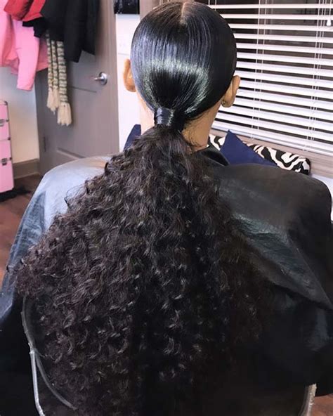 3 creating a sleek style. 21 Sleek Ponytail Hairstyles Perfect for Any Occasion ...