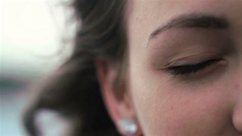 Close Up Of Young Woman Opening Her Eye And Blinking Close Up Green