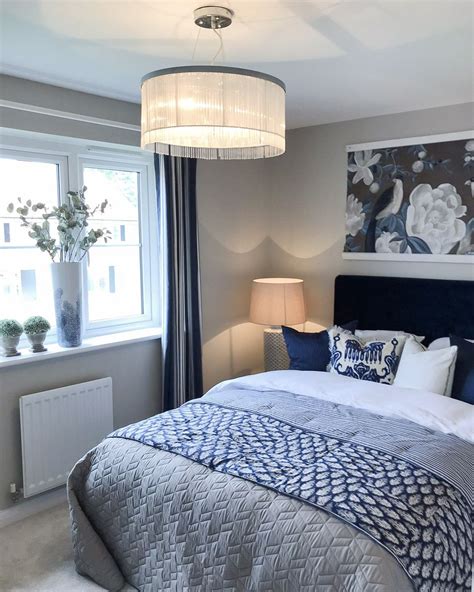 This room screams of feminine style. New build master bedroom with grey and royal blue | Royal ...
