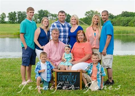 Navy and white family beach pictures. Congrove family pictures teal coral navy coordinating ...