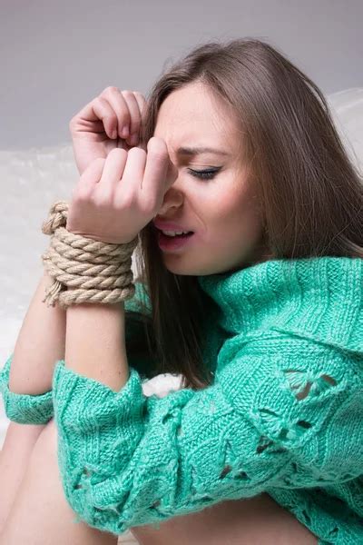 Girl With His Hands Tied Crying — Stock Photo © Kopitin 76318685