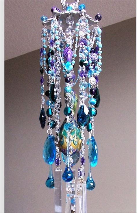 You may want to position a wind chime in a door or window, so you can subtly brush past it or reach out and touch it with your hands when you go past. Pin on Chimes