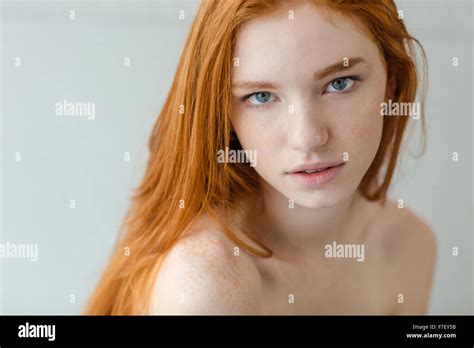 Portrait Of Attractive Redhead Woman Looking At Camera Stock Photo Alamy