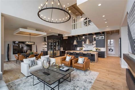 A contemporary modern style room can be transformed into a cozy farmhouse living room retreat by incorporating various suitable furniture and ornaments. Striking modern farmhouse in Alberta designed to feel like ...