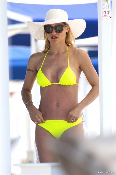 Top Celebrity Model Michelle Hunziker Sunbathing In Yellow The Best Porn Website