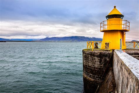 Reykjavik Harbor Lighthouse Photograph By Alexey Stiop Fine Art America