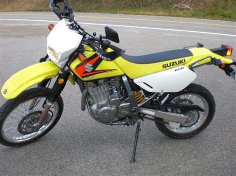 Uses the same fork modifications as our stage 1 package, but coupled with a tfx 141 rear shock and includes high and low speed compression adjustment , rebound adjustment with remote reservior. 2005 Suzuki DR 650 SE - Moto.ZombDrive.COM