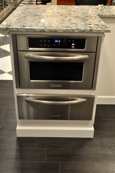 Choose one of the enlisted appliances to see all available service manuals. KitchenAid mircowave with slow cook warming drawer below ...