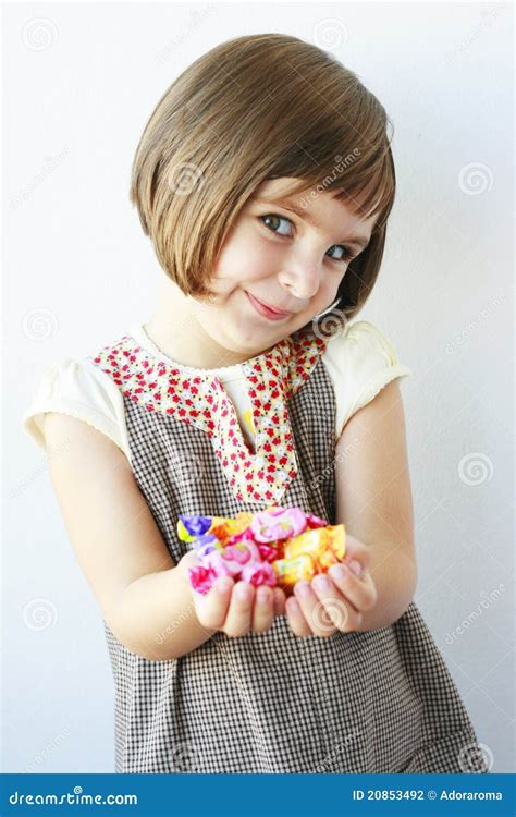 Little Girl Holding Candies Stock Photo Image Of Child Candy 20853492