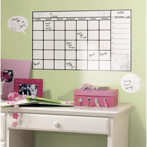 It works and looks just like one for $300! 10 in. x 18 in. Dry Erase Calendar 7-Piece Peel and Stick Wall Decal-RMK1556SCS - The Home Depot
