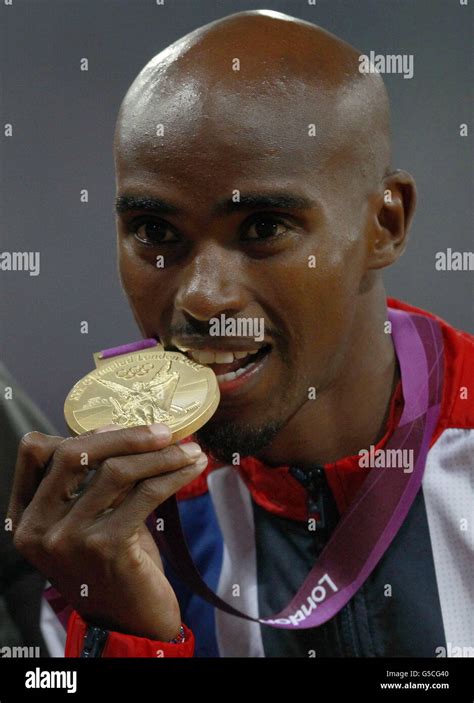 Great Britains Mo Farah With His Gold Medal After Winning The Mens