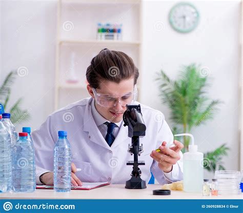 Young Male Chemist Experimenting In Lab Stock Photo Image Of