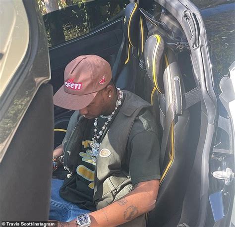 Travis Scott Jumps Into His Limited Edition Ferrari Worth An Eye