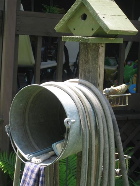 You drain it and wind it into a coil. Homestead Crossing Inc's Blog: DIY Water Hose Storage ...