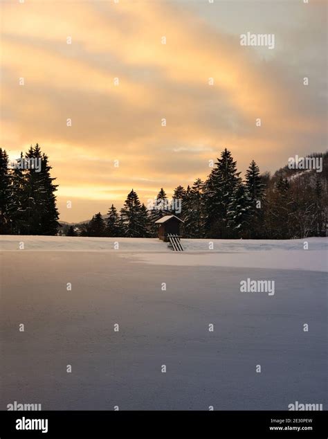 Frozen Lake During Sunrise Stock Photo Alamy