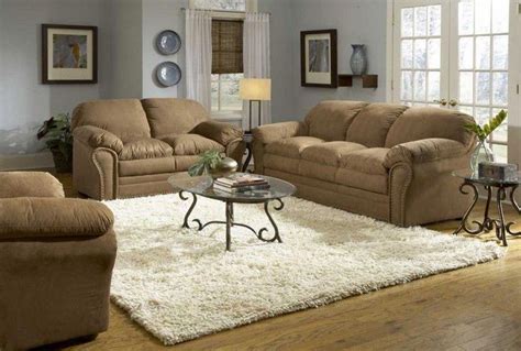 Light Gray Walls With Brown Leather Couch Brown Sofas Cream Rug